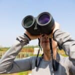 a person using binoculars