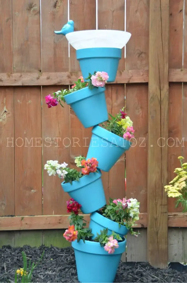 a birdbath made from terracotta pots