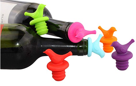 various colored bird wine bottle stoppers and two wine bottles