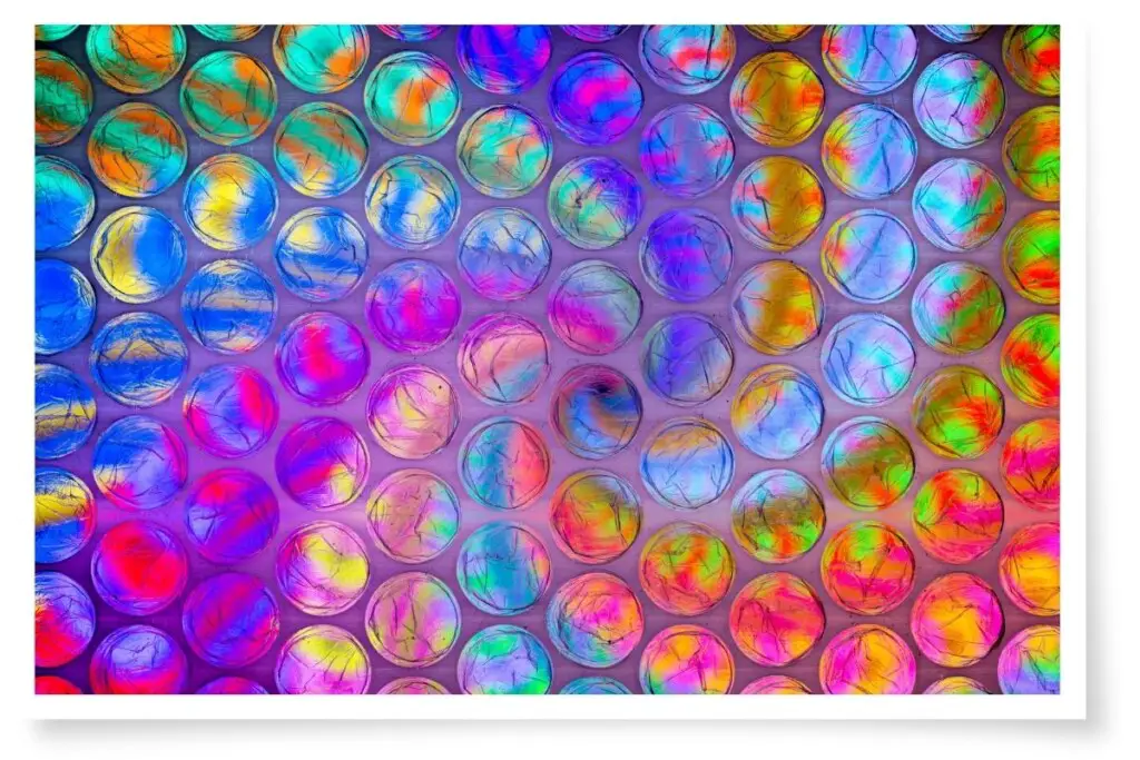 bubble wrap photographed over swirling colors