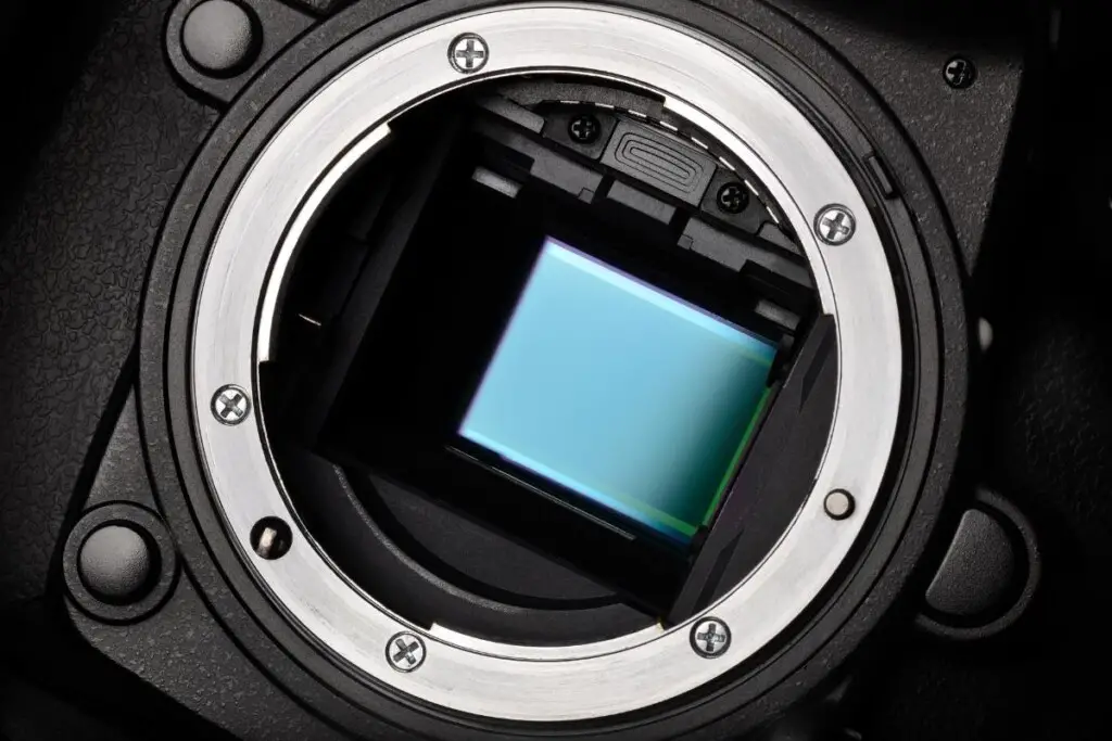 the sensor inside a dslr camera seen through the lens opening
