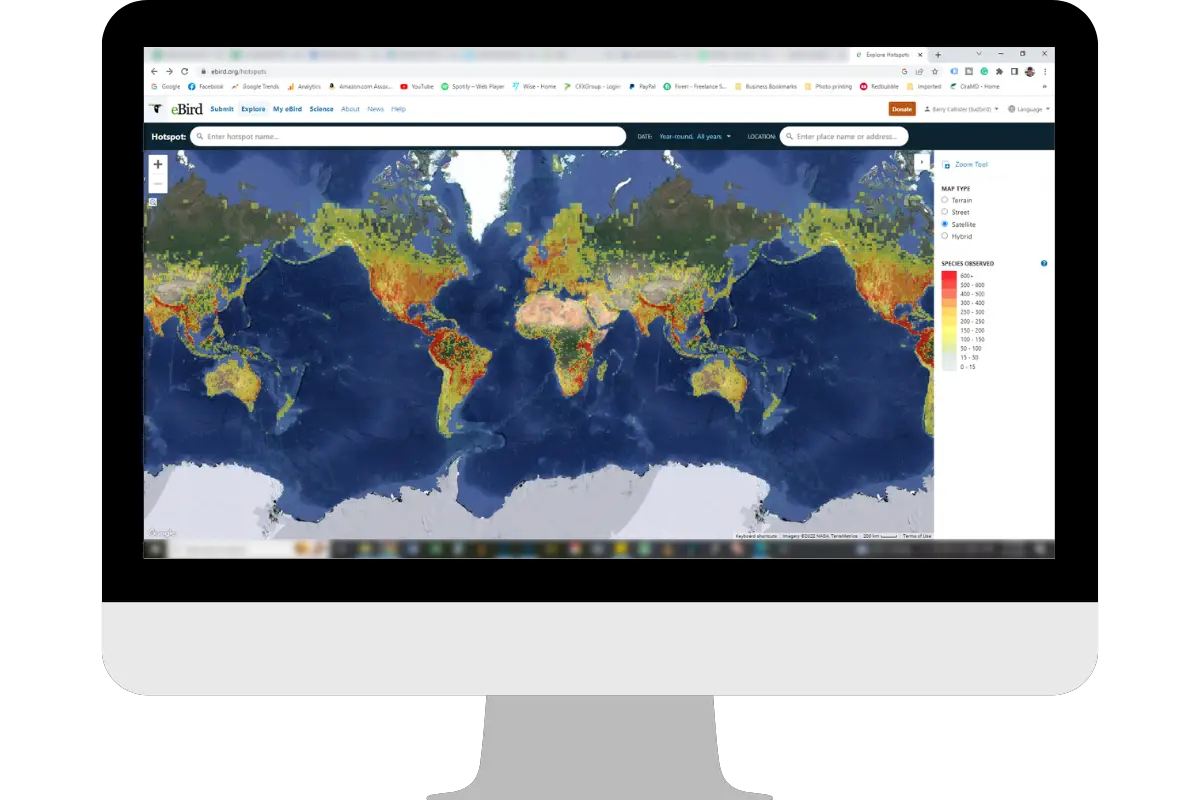 plan a birding trip - a computer monitor with the eBird Explore Hotspots page map showing